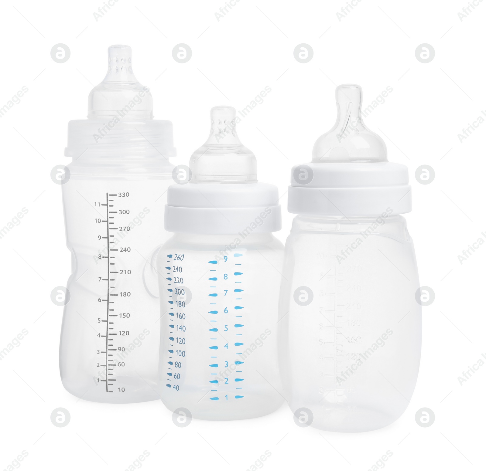 Photo of Three empty feeding bottles for baby milk on white background