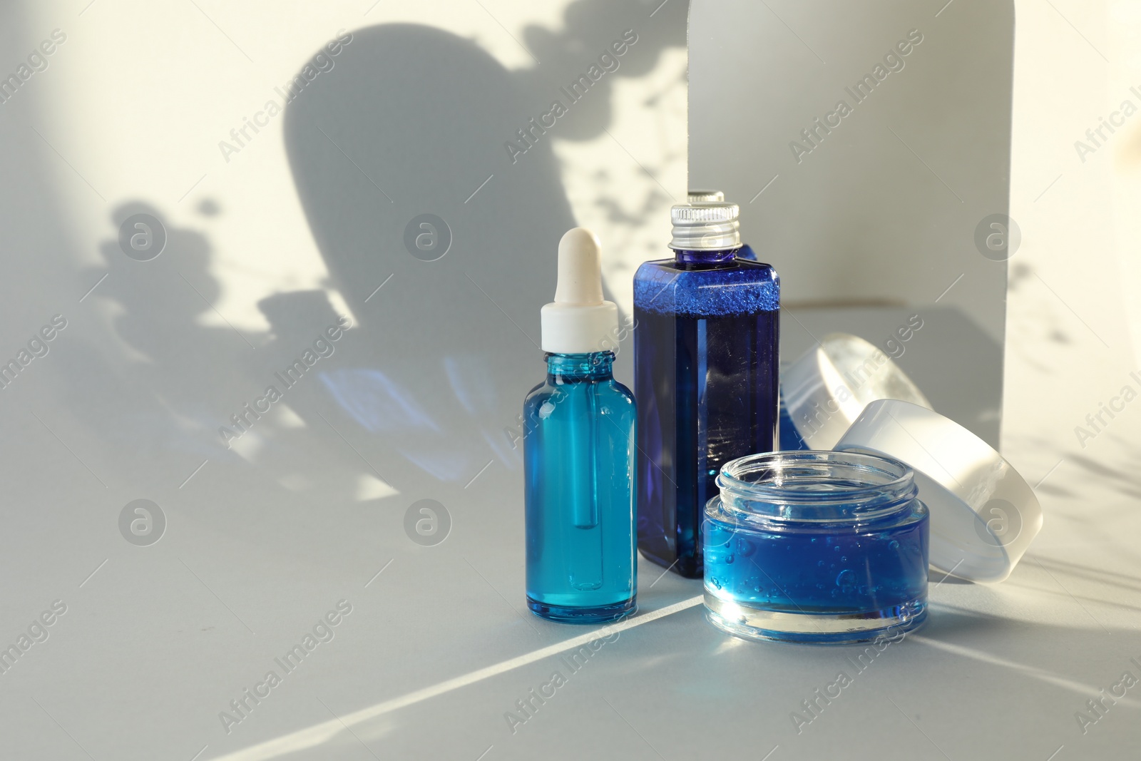 Photo of Set of luxury cosmetic products on white background. Space for text