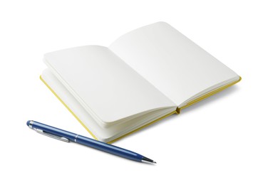 Photo of Open notebook with blank pages and pen isolated on white