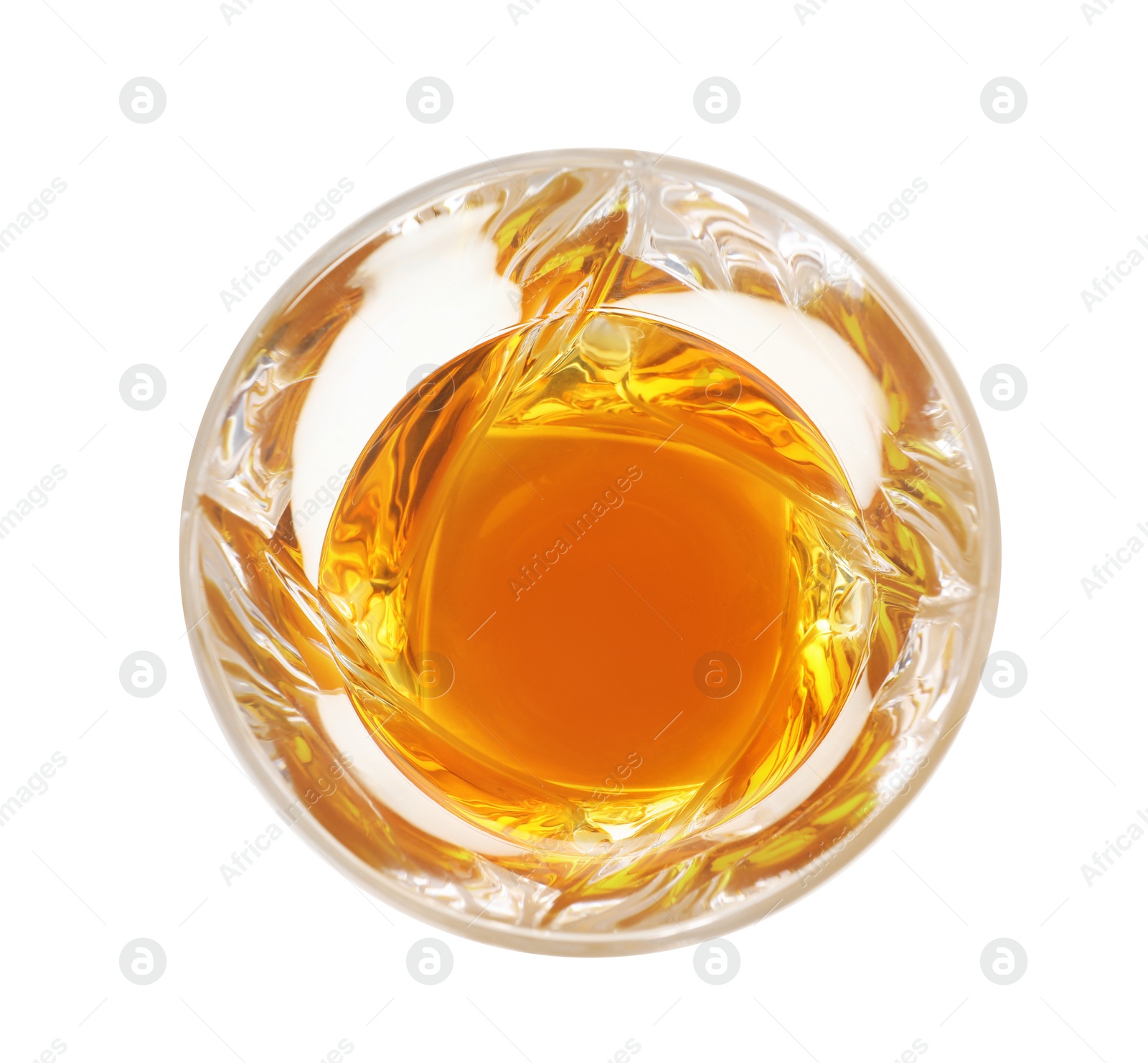 Photo of Glass of expensive whiskey on white background, top view