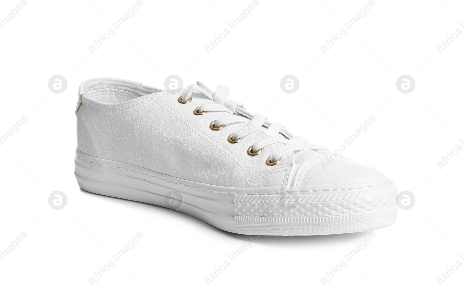 Photo of Stylish sneaker on white background. Trendy footwear