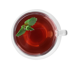 Photo of Cup with hot aromatic mint tea isolated on white, top view