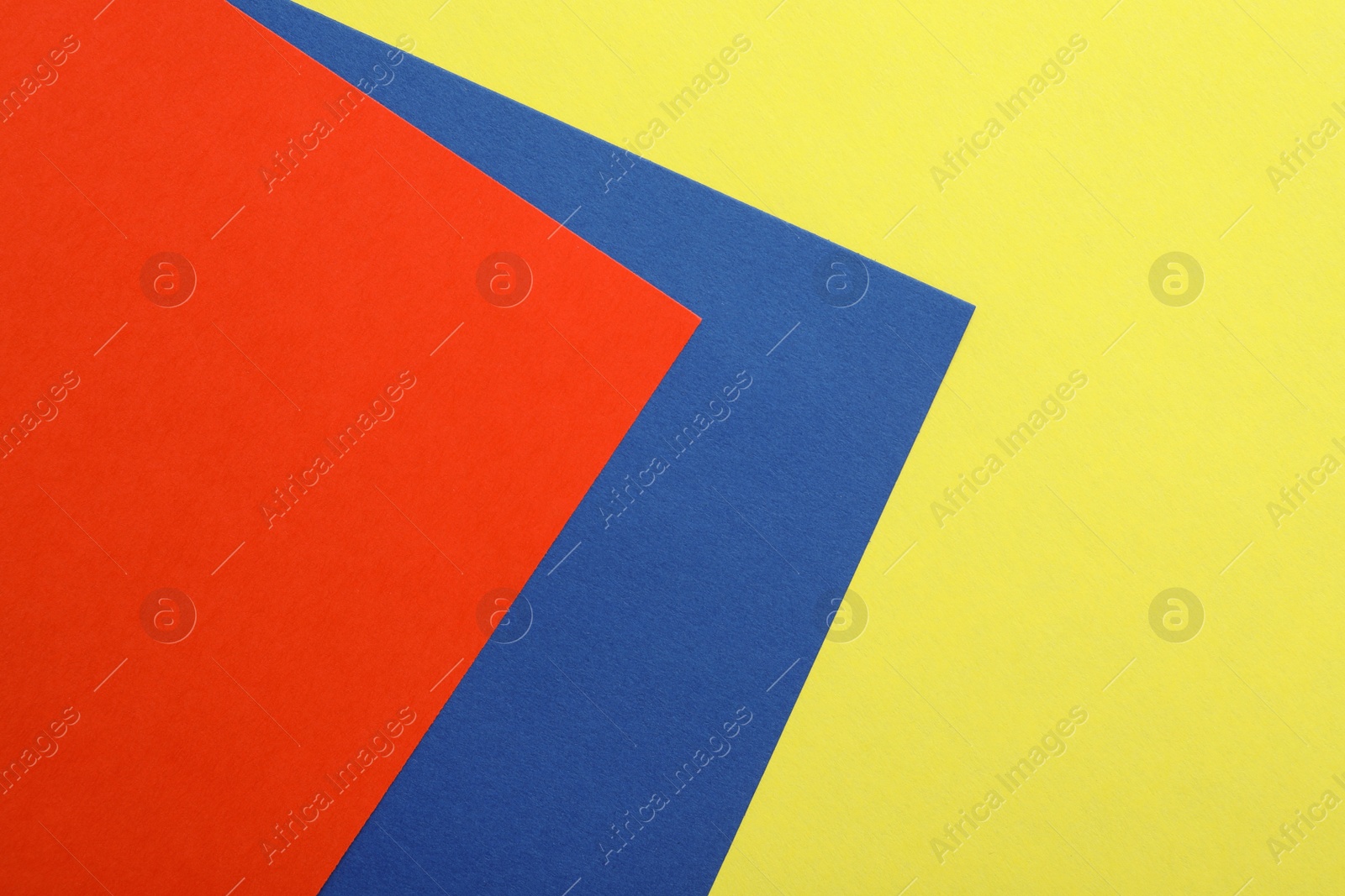 Photo of Colorful paper sheets as background, top view