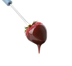 Strawberry with chocolate on fondue fork against white background