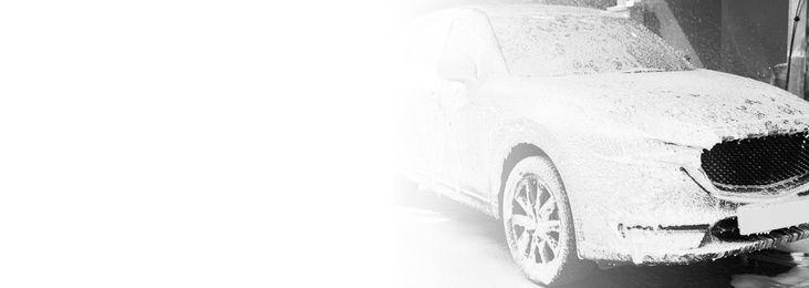 Image of Auto with foam at car wash, space for text. Banner design