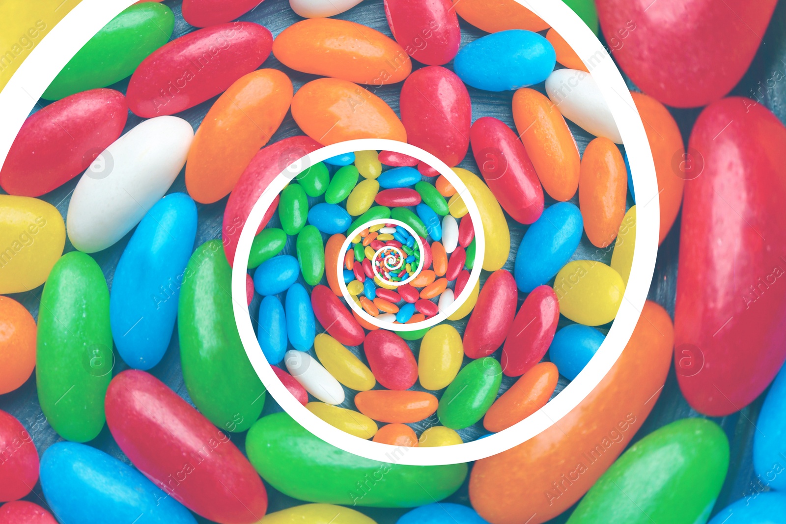 Image of Whirl of many colorful jelly bean candies as background