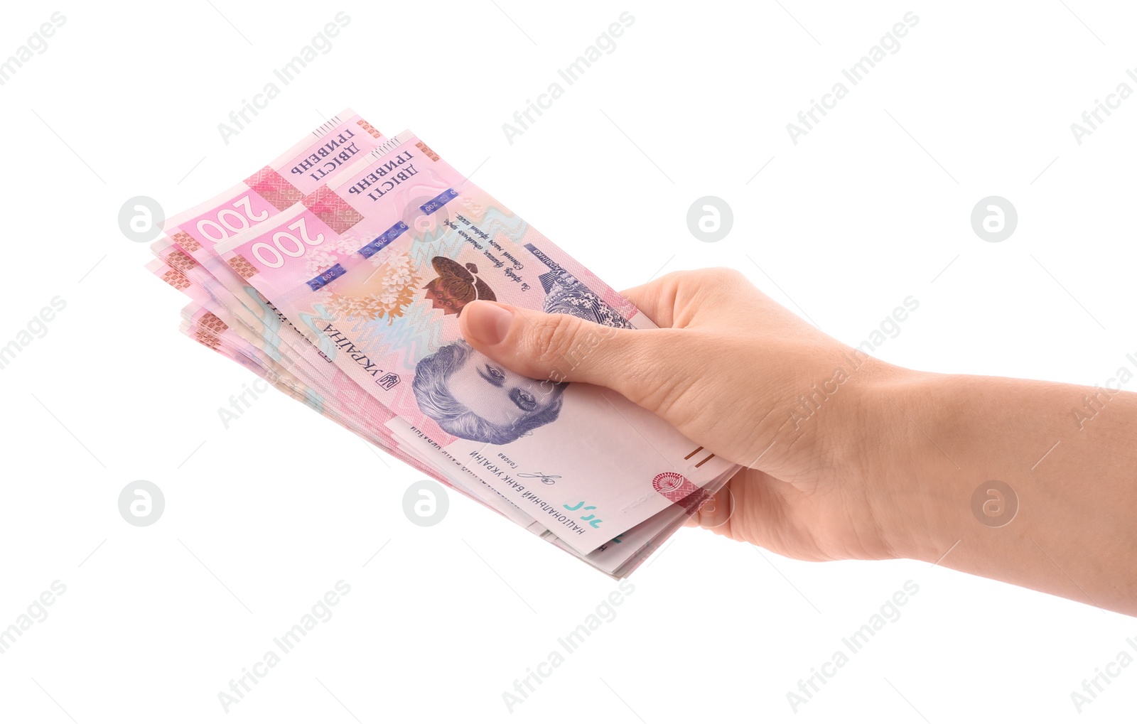 Photo of Woman holding Ukrainian money on white background, closeup