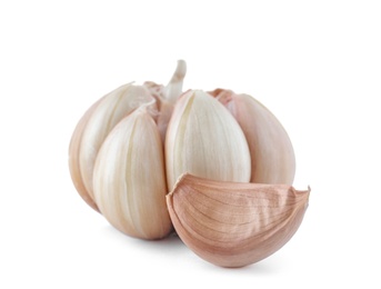 Photo of Fresh garlic bulb and clove on white background. Organic food