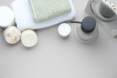 Photo of Bath accessories. Flat lay composition with personal care products on light grey background, space for text