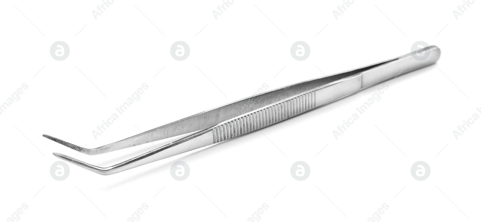 Photo of Stainless forceps on white background. Medical tool