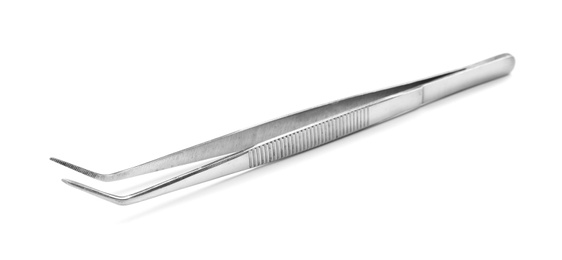 Photo of Stainless forceps on white background. Medical tool