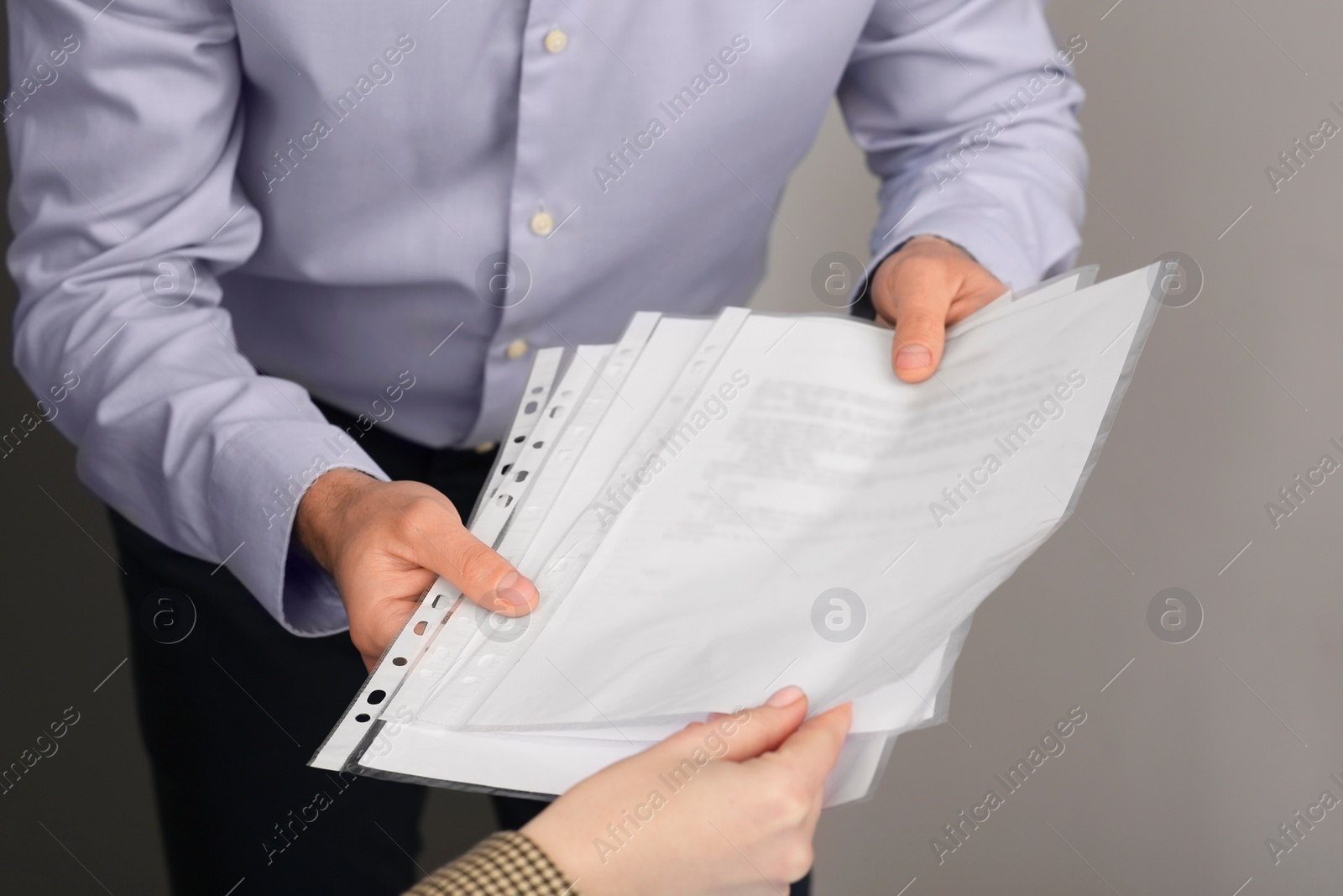 Photo of Businesspeople working with documents in office, closeup