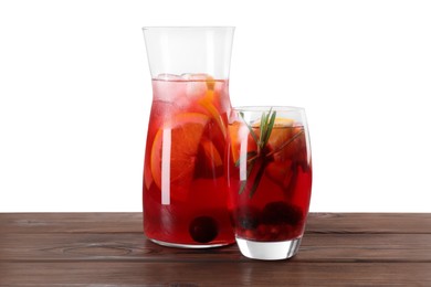 Delicious sangria on wooden table against white background