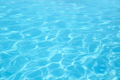 Photo of Swimming pool with clean water as background, closeup