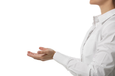 Businesswoman holding something on white background, closeup