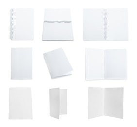 Image of Set with blank paper brochures on white background. Mockup for design