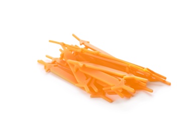 Photo of Orange silicone shoe laces on white background