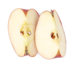 Photo of Pieces of ripe red apple isolated on white, top view