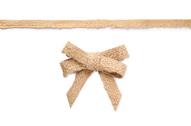 Image of Pretty burlap bow and ribbon on white background 