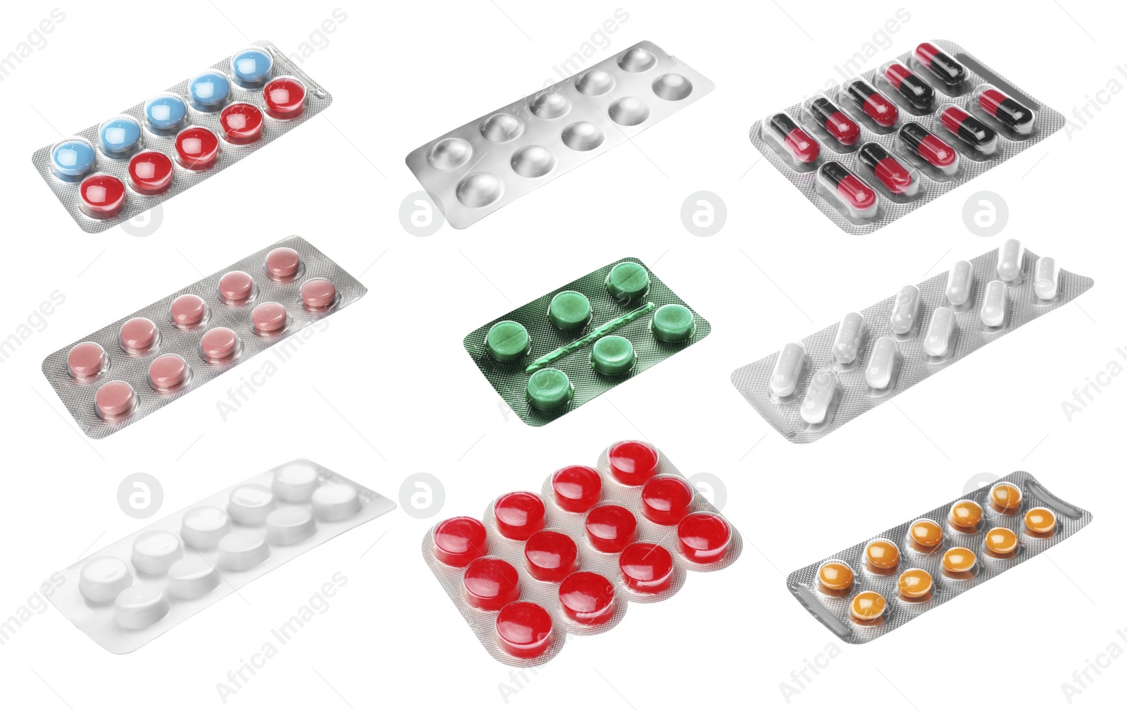 Image of Set with different pills in blister packs on white background