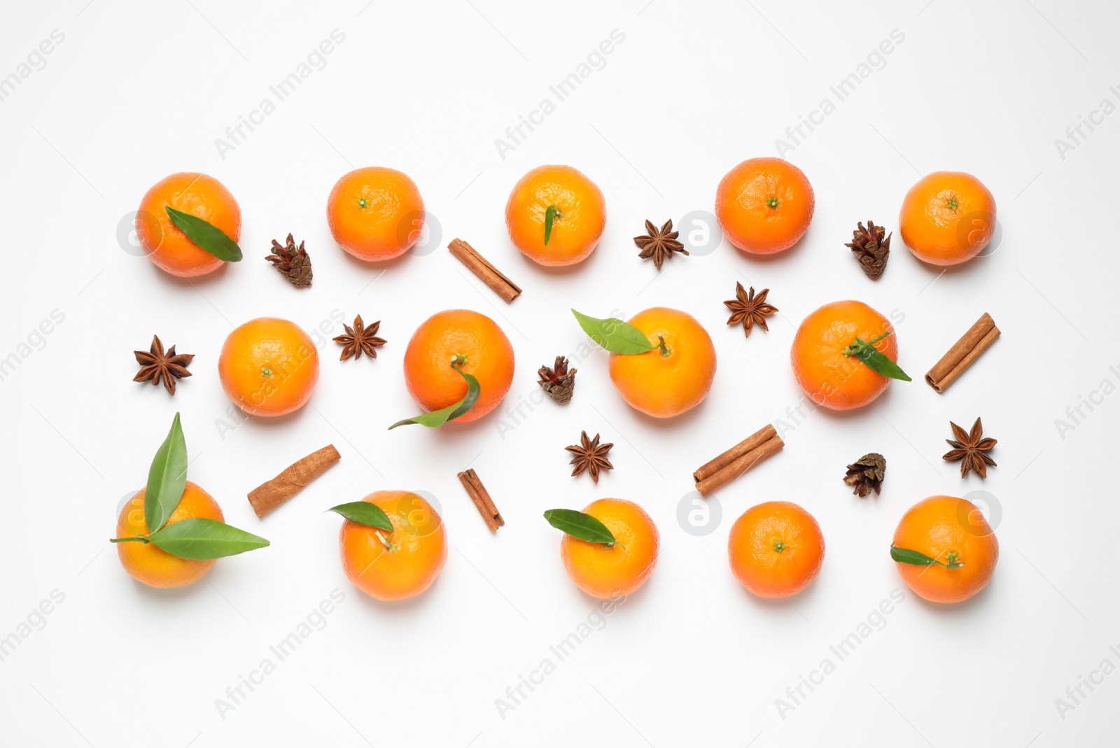 Photo of Christmas composition with tangerines on white background, flat lay