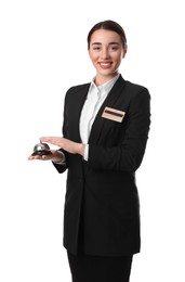 Photo of Happy young receptionist in uniform holding service bell on white background