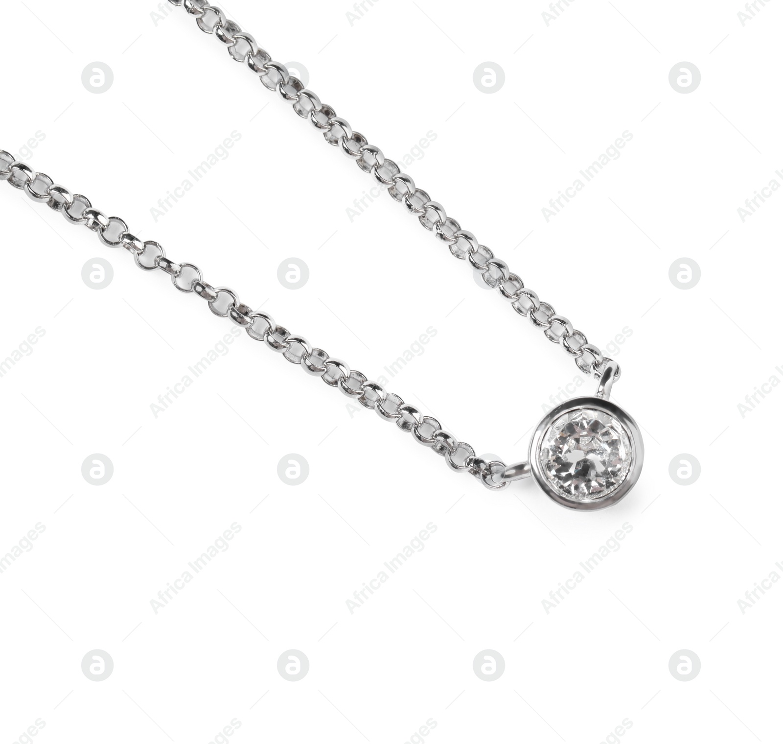 Photo of Elegant silver necklace with gemstone isolated on white, top view. Luxury jewelry