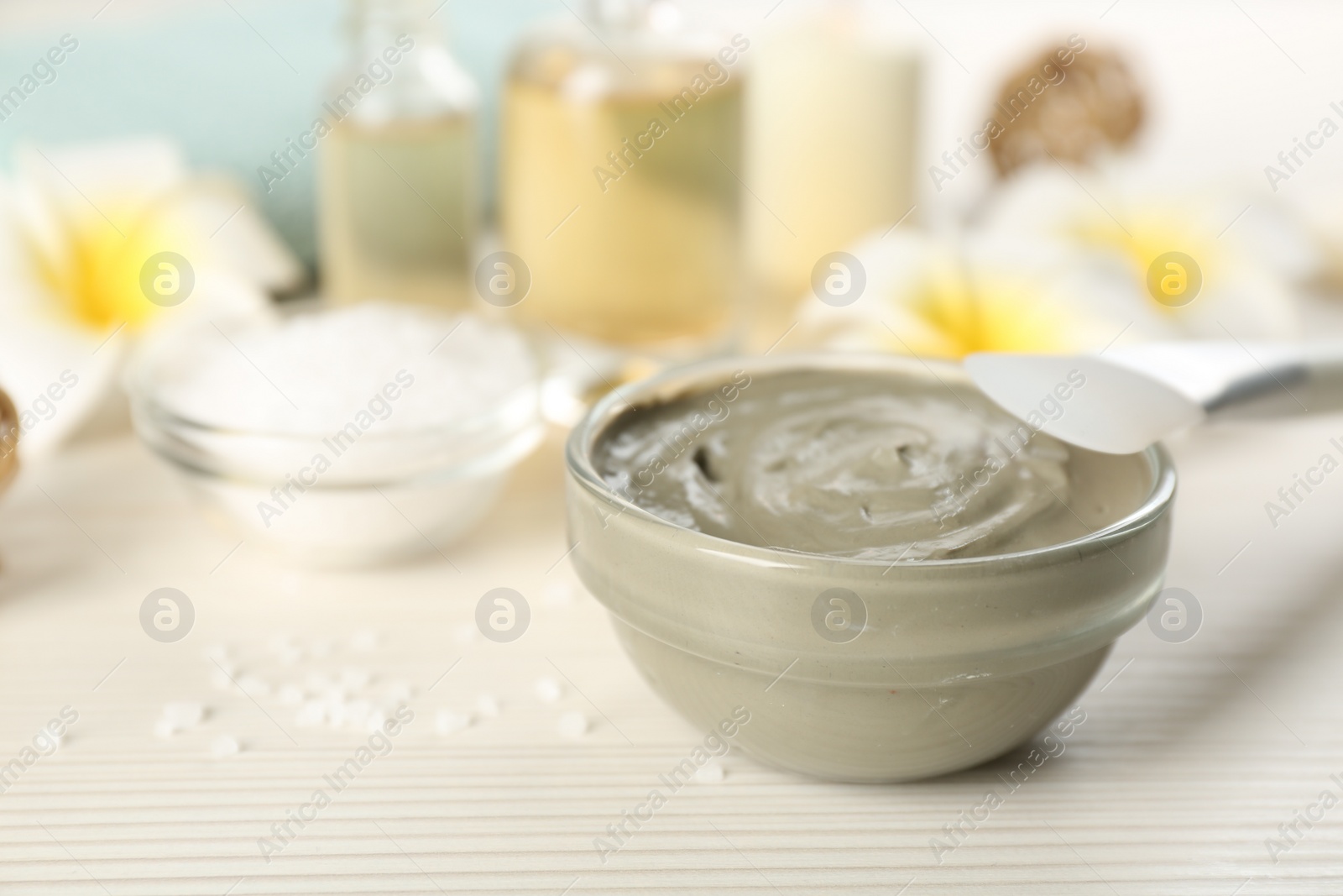 Photo of Composition with cosmetic product for spa body wraps on white wooden background