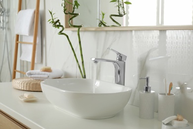 Stylish white sink in modern bathroom interior