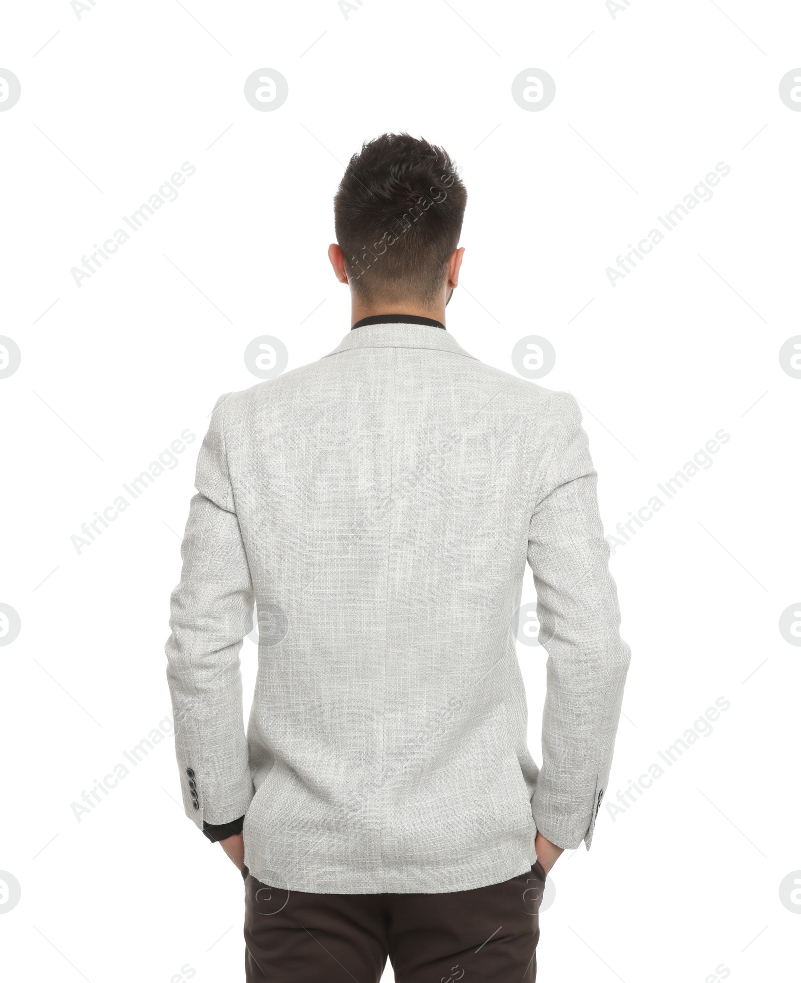 Photo of Young professional businessman in suit on white background, back view
