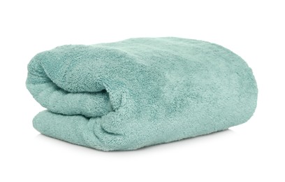 Photo of Folded soft terry towel on white background