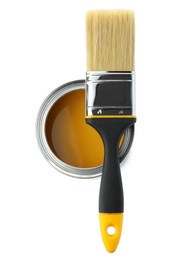 Paint can and brush on white background, top view