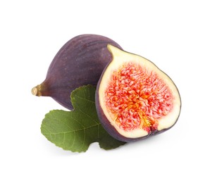 Photo of Cut and whole ripe figs isolated on white