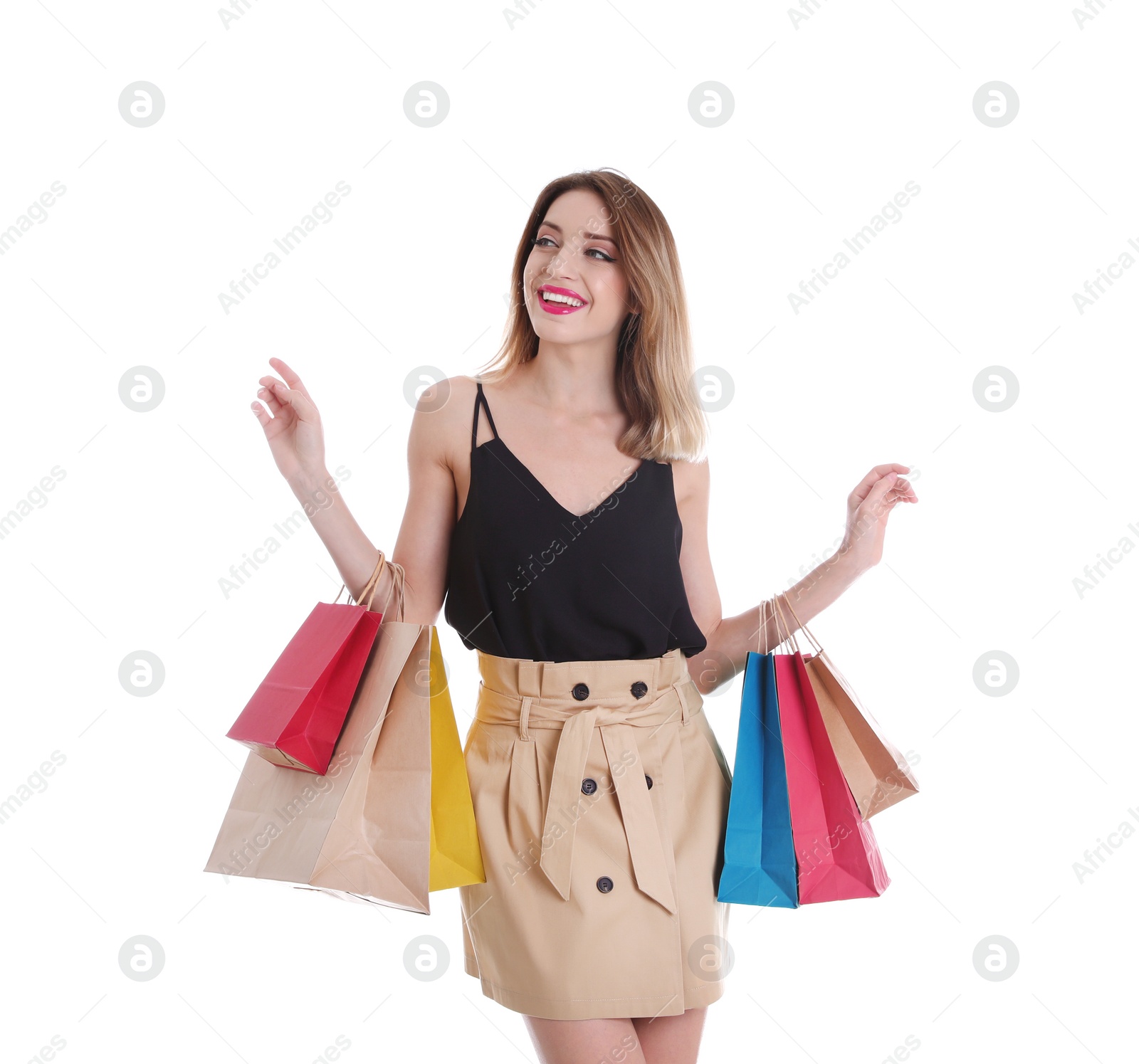 Photo of Beautiful young woman with shopping bags on white background