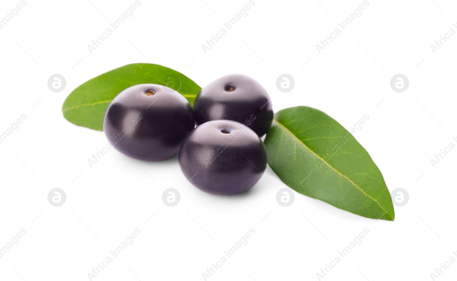 Photo of Fresh acai berries with leaves isolated on white
