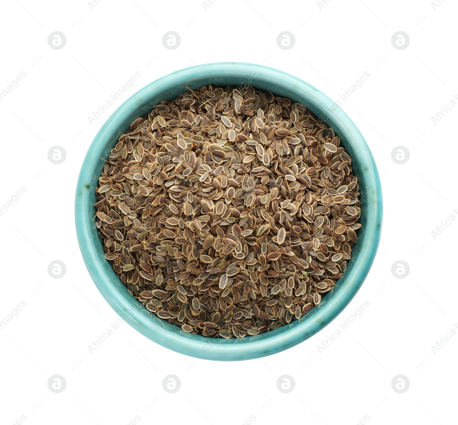 Photo of Bowl of dry dill seeds isolated on white, top view