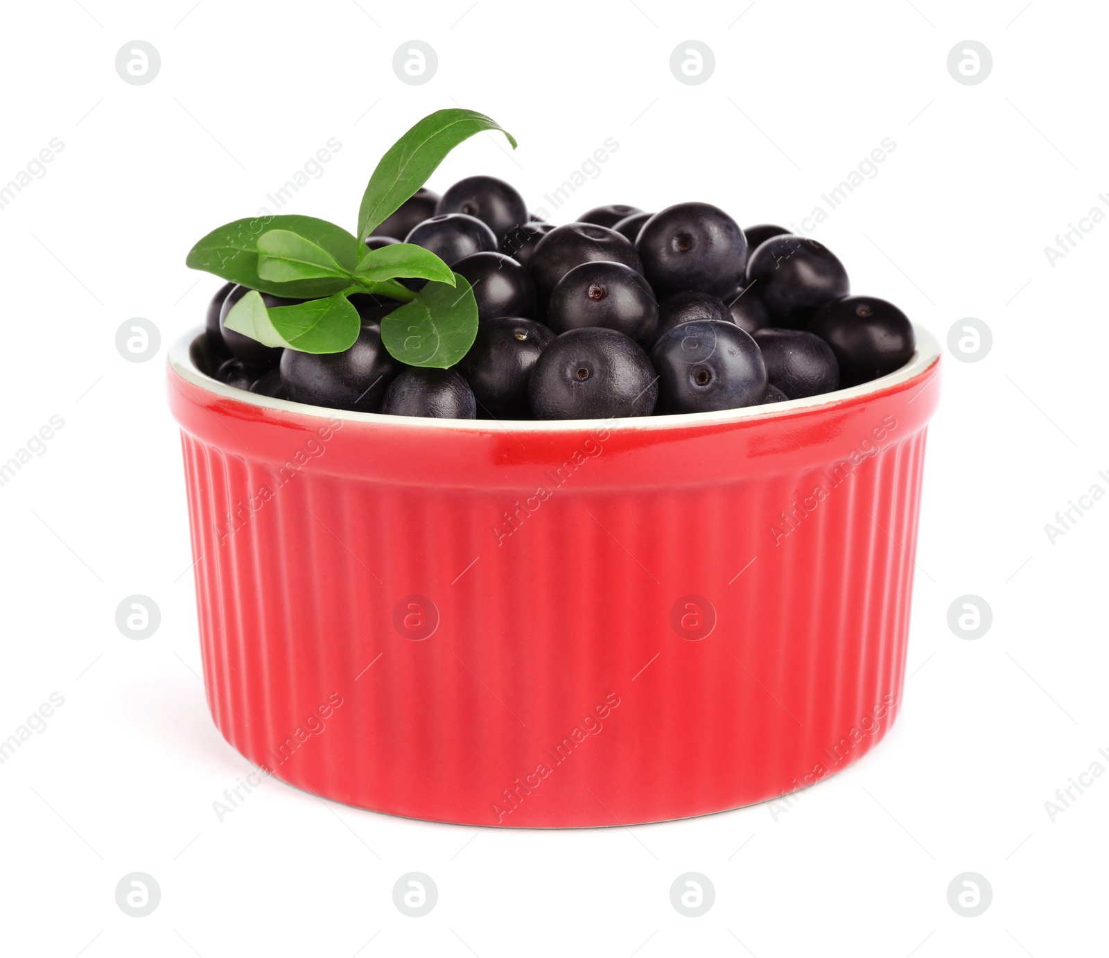 Photo of Bowl with fresh acai berries on white background