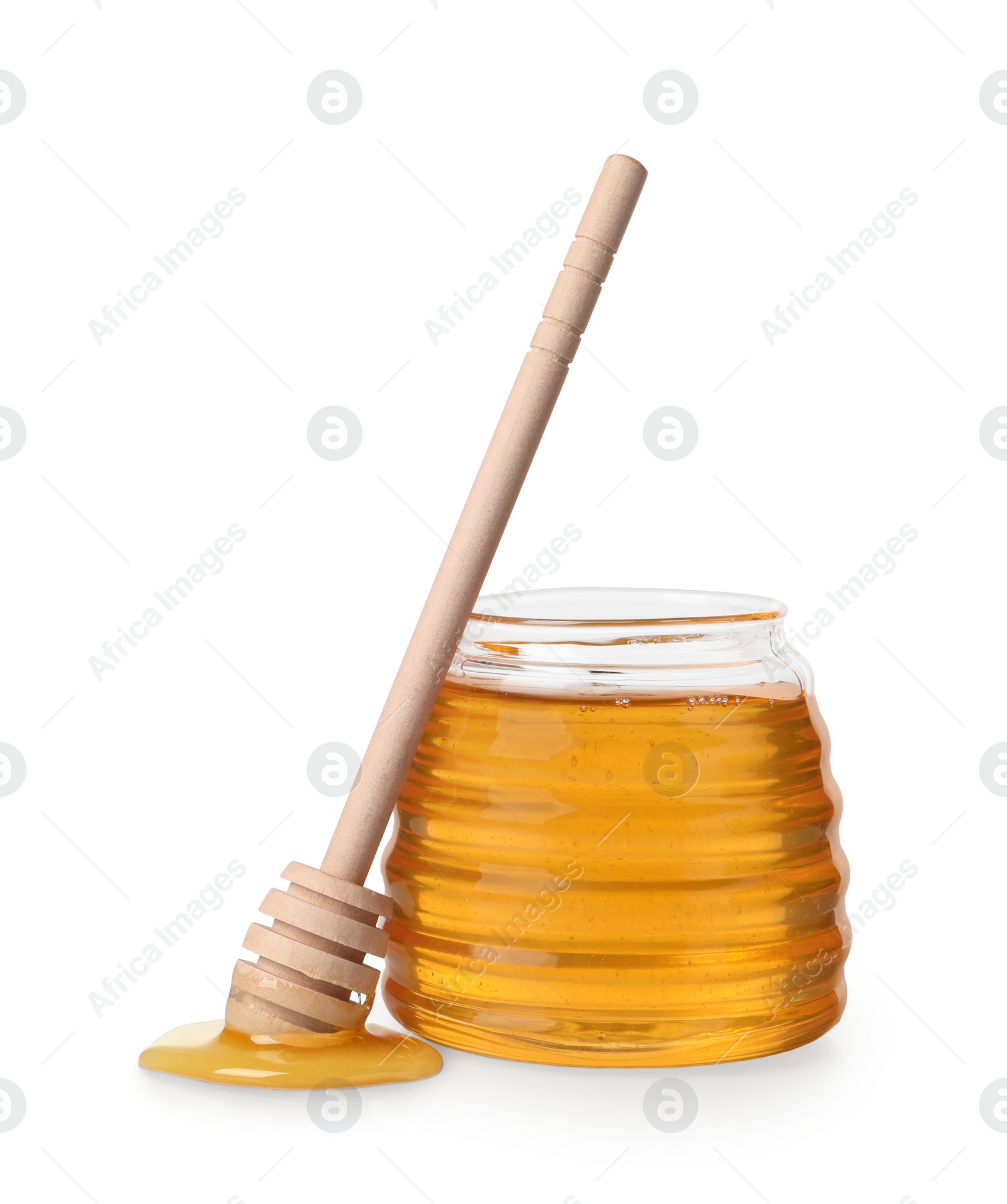 Photo of Tasty honey in glass jar and dipper isolated on white