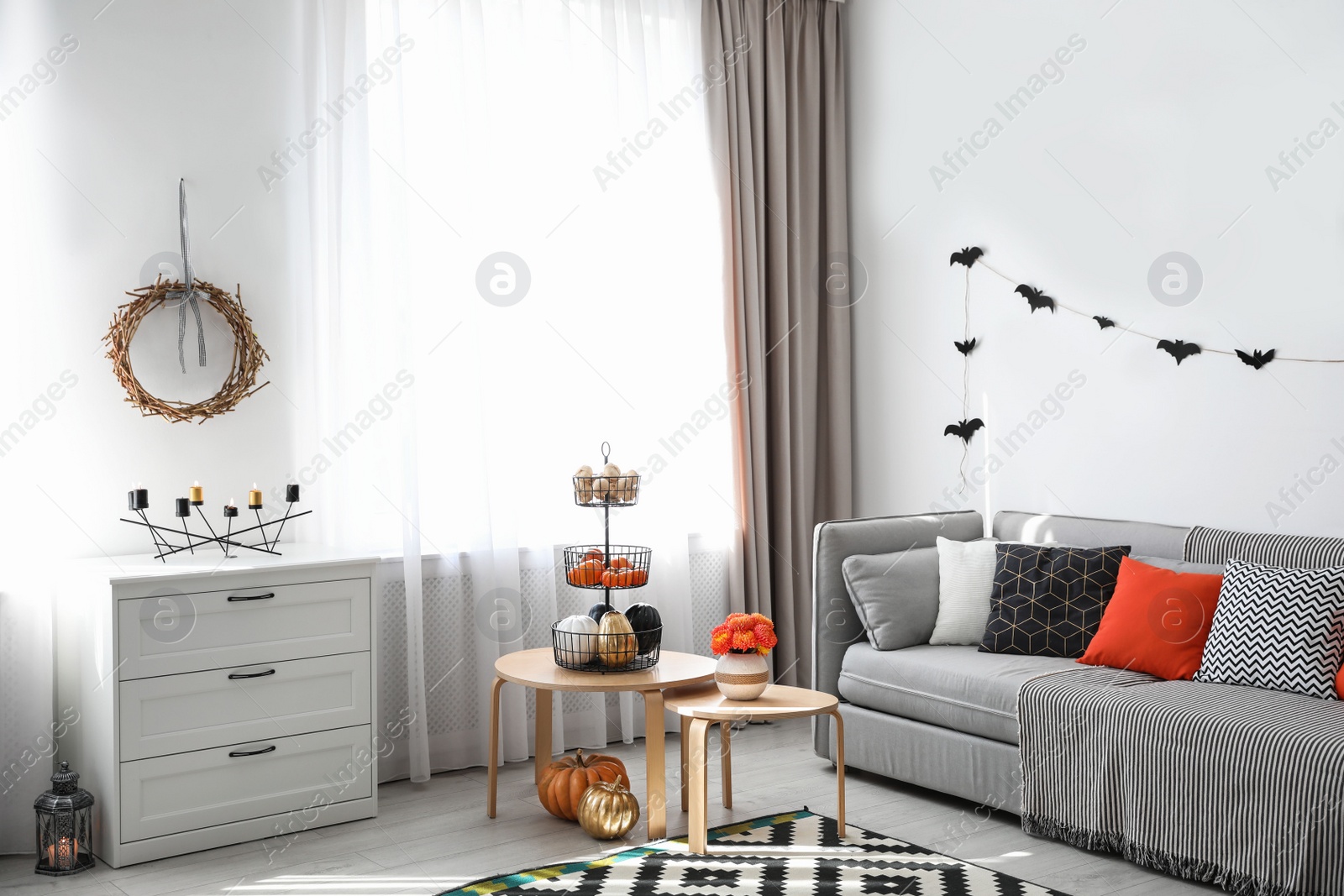 Photo of Modern room decorated for Halloween. Festive interior