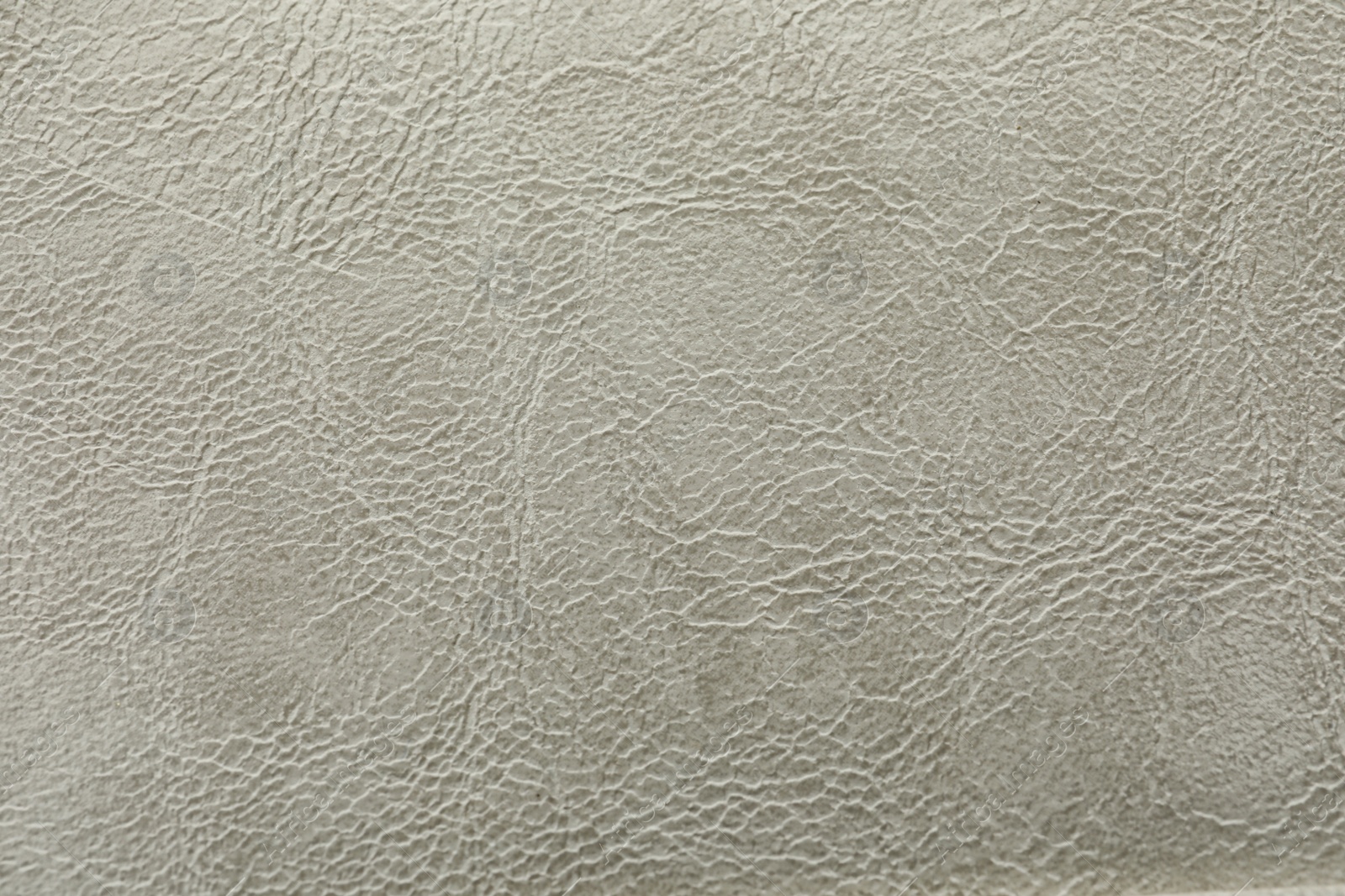 Photo of Texture of grey leather as background, closeup