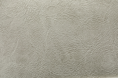 Texture of grey leather as background, closeup