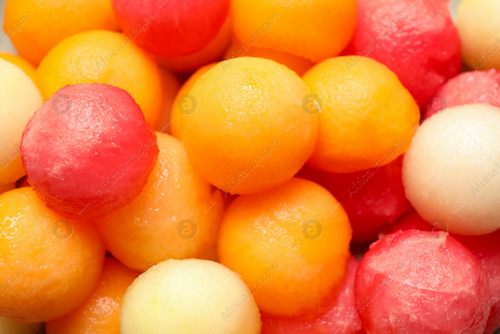 Photo of Melon and watermelon balls as background, closeup