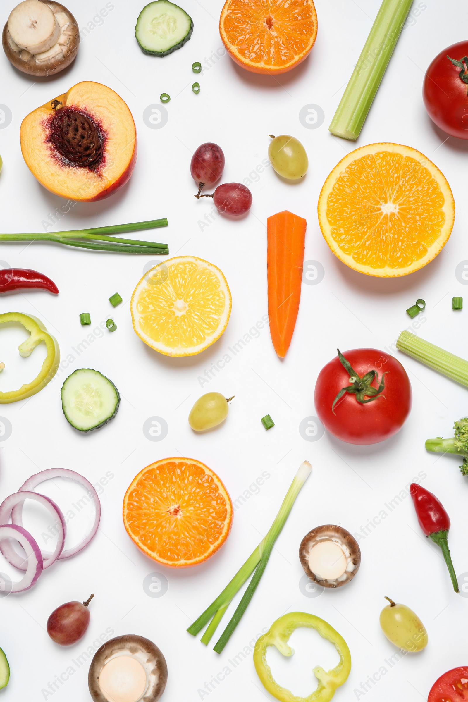 Photo of Fresh organic fruits and vegetables on white background, flat lay