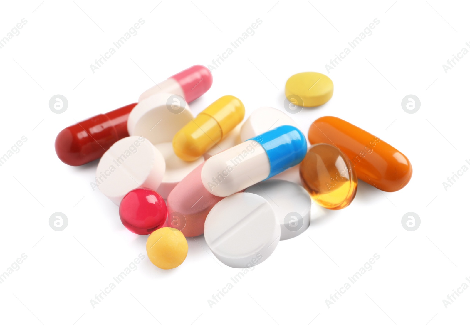 Photo of Many different pills isolated on white. Medicinal treatment