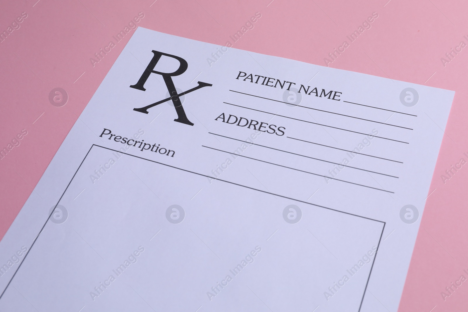 Photo of Medical prescription form on pink background, closeup