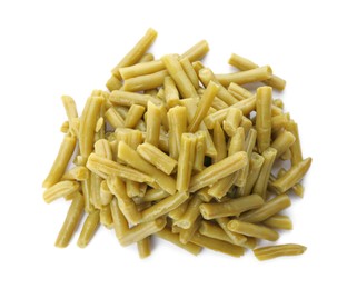 Pile of canned green beans on white background, top view
