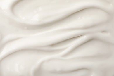 Photo of Delicious organic yogurt as background, top view