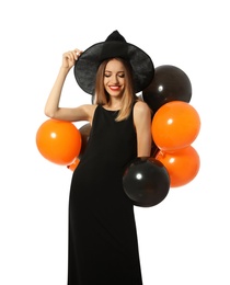 Photo of Beautiful woman wearing witch costume with balloons for Halloween party on white background