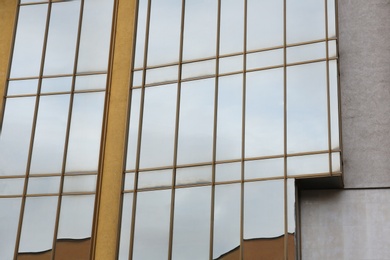 Photo of Modern office building with tinted windows. Urban architecture