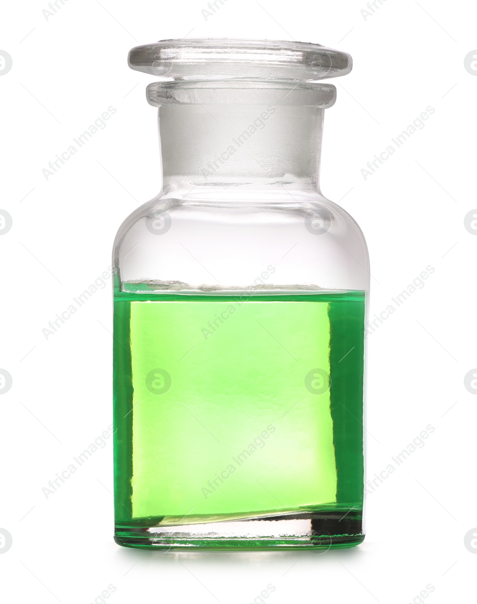 Photo of Laboratory glassware with liquid on white background. Solution chemistry